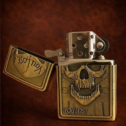 Briquet tempête métal vintage – Tête de mort "You lose" 2