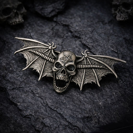 Barrette tête de mort ailée