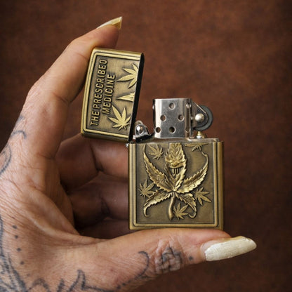 Briquet Tempête Métal Vintage – Feuille de Cannabis